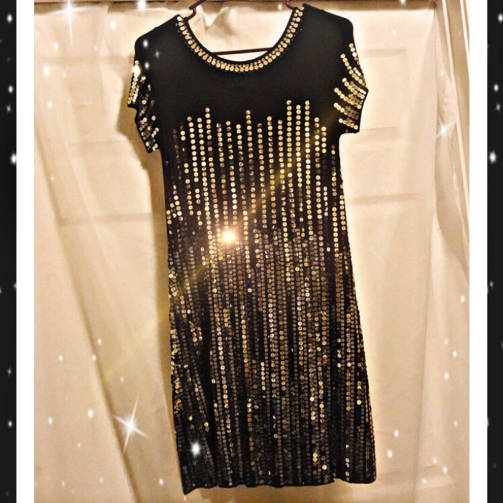 Lightweight Black dress with sequin detailing.